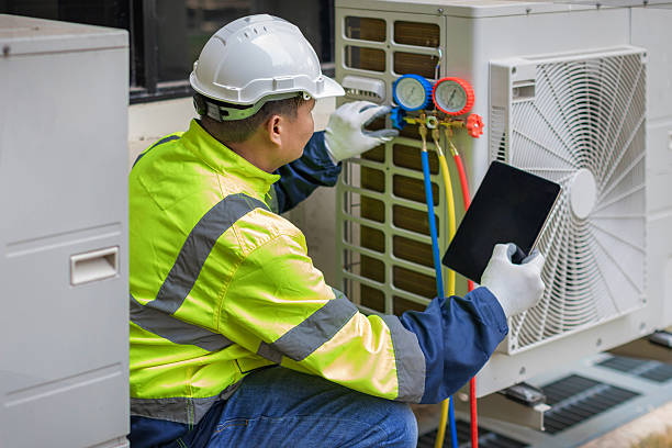 Professional Heat Pump Repair technician working in Ramona, CA